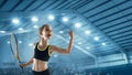 Little caucasian girl playing tennis on sport court background Royalty Free Stock Photo