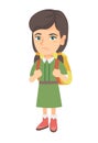 Little caucasian sad schoolgirl carrying backpack.