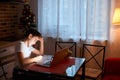 Little boy tired of doing homework at home using laptop Royalty Free Stock Photo