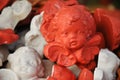 Little ceramic ornaments of cute cupids