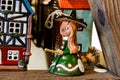 Little ceramic statuette of ginder witch and house in Riga, Latvia 2019 Royalty Free Stock Photo