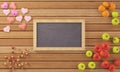 Little chalkboard surrounded by fruits and cookies