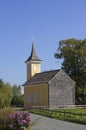 Little chapel beside the road in rural landscape Royalty Free Stock Photo