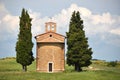 Little chapel surrounded by cypress trees Royalty Free Stock Photo