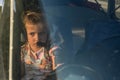 ROMA, ITALY - AUGUST 2018: Little charming little girl pilot, child in the cockpit of light-engine aircraft Tecnam P92-S Echo