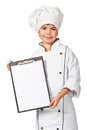 Little chef holding blank chefs menu board Royalty Free Stock Photo