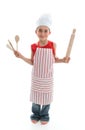 Little chef holding kitchen utensils Royalty Free Stock Photo