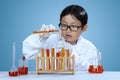 Little chemist mixes the chemical fluid