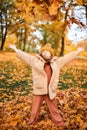 Little Child Baby Girl Caucasian Walking in Park with Leaf Autumn