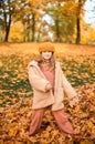 Little Child Baby Girl Caucasian Walking in Park with Leaf Autumn