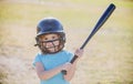 Little child baseball player focused ready to bat. Kid holding a baseball bat. Royalty Free Stock Photo