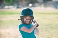 Little child baseball player focused ready to bat. Sporty kid players in helmet and baseball bat in action. Royalty Free Stock Photo