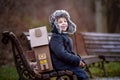 Little child, blond boy with pet dog, carying home on his back, kid, having paper house