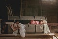 Little child, boy, hiding in old vintage suitcase in the attic