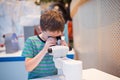 Little child boy looking through microscope Royalty Free Stock Photo