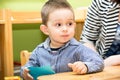 Little child boy playing in kindergarten in Montessori preschool Royalty Free Stock Photo