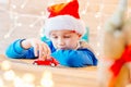 Little child boy playing with red toy car Royalty Free Stock Photo