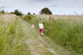 Little child catching butterflies Royalty Free Stock Photo