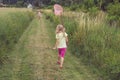 Little child catching butterflies Royalty Free Stock Photo