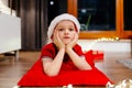 Little child dreaming about Christmas. Royalty Free Stock Photo