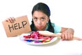 Little child eating sweet sugar in candy dish holding sugar spoo Royalty Free Stock Photo