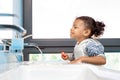 Little child girl brushing teeth in bathroom Royalty Free Stock Photo