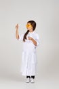 Little child girl holding a chemical flask and test tube Royalty Free Stock Photo