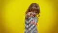 Little child girl looking authoritative, fingers down, demanding serious conversation giving command Royalty Free Stock Photo