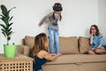 Little child girl playing game in virtual reality glasses Royalty Free Stock Photo