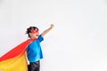 Little child girl plays superhero. Child on the white background. Girl power concept Royalty Free Stock Photo