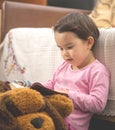 Little child girl reading the Bible Royalty Free Stock Photo