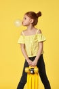 little child girl with yellow skateboard Royalty Free Stock Photo