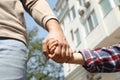 Little child holding hands with his father  outdoors, closeup. Royalty Free Stock Photo