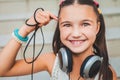 Little child holding the wire and smiling