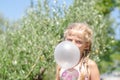 Little child with huge bubble from chewing gum Royalty Free Stock Photo