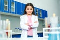 Little child with learning class in school laboratory serious