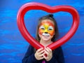 Little child with lion face painting Royalty Free Stock Photo