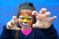 Little child with lion face painting Royalty Free Stock Photo