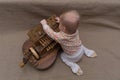 Little child with musical instrument hurdy-gurdy