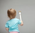 Little child painting the wall Royalty Free Stock Photo