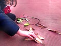 Little child playing, expolring and gardening in the garden with soil, leaves, nuts, sticks, plants, seeds during a school Royalty Free Stock Photo