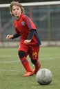 Little child playing football or soccer