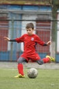 Little child playing football or soccer
