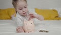 little child put money piggy bank, collect cash coins bank, save money success, wealth financial savings idea, small Royalty Free Stock Photo