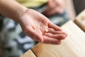 Little child`s hand holds lost tooth. small hand with missing tooth with caries Royalty Free Stock Photo