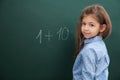 Little child solving math sum