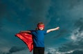 Little child superhero with hero cloak. Success, motivation concept. Royalty Free Stock Photo