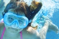Little child underwater in the swimming pool Royalty Free Stock Photo