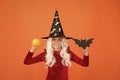 Little child in witch costume. Halloween party. Small girl in black witch hat. Autumn holiday. Join celebration. Magical Royalty Free Stock Photo