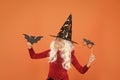 Little child in witch costume. Magical spell. Small witch with white hair. Wizard or magician. Halloween party. Photo Royalty Free Stock Photo